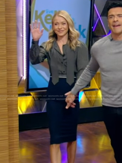 Kelly’s black polka dot print tie neck blouse on Live with Kelly and Mark