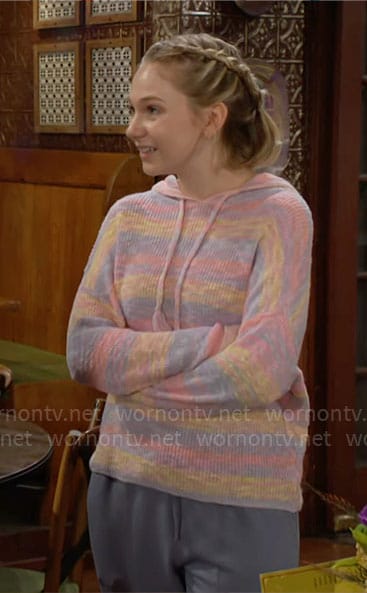 Lucy’s pastel striped knit hoodie on The Young and the Restless