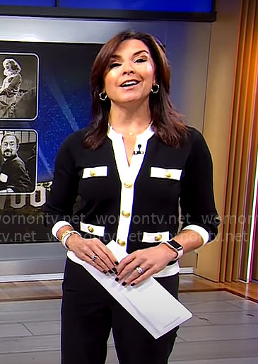 Meg Oliver’s black and white cardigan with gold buttons on CBS Mornings