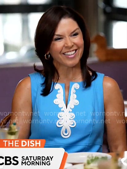 Meg Oliver’s blue dress with white embroidery on CBS Mornings