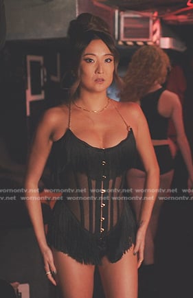 Mindy’s black fringed corset top on Emily in Paris