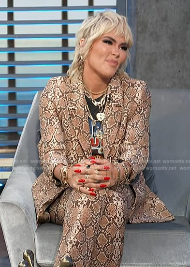 Nadine Crocker’s snakeskin print suit on Access Hollywood