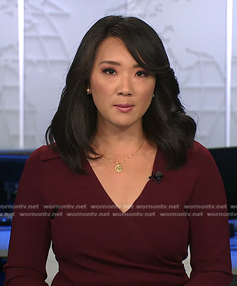 Nancy Chen’s burgundy collared wrap dress on CBS Evening News