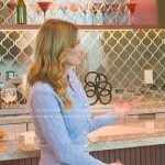 Nicole’s blue cardigan and knit skirt on Selling Sunset