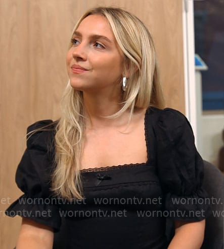 Savannah’s black square-neckline dress on Owning Manhattan