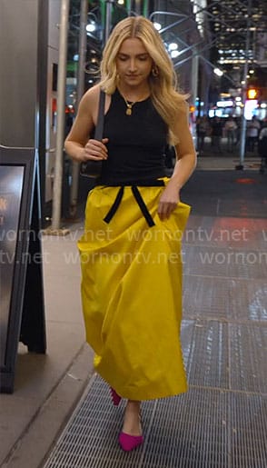 Savannah’s black top and yellow maxi skirt on Owning Manhattan