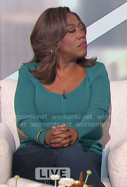Sheryl’s teal rib knit long sleeve top on The Talk