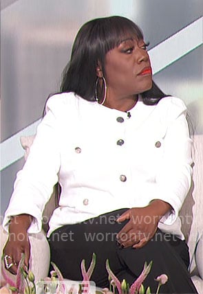 Sheryl’s white jacket with silver buttons on The Talk