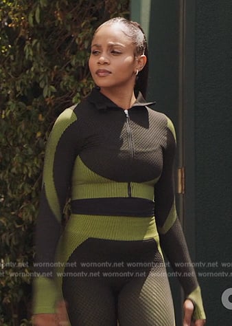 Simone’s black and green crop top and leggings on All American Homecoming
