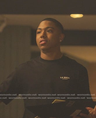 Spenser’s black logo tee on Reasonable Doubt