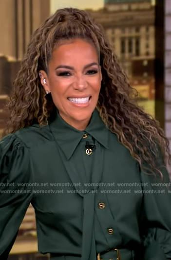 Sunny’s green tie neck satin blouse and pants on The View