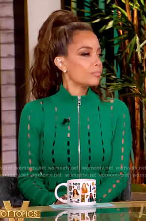 Sunny’s green cutouts long sleeve dress on The View