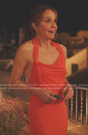 Sylvie’s orange halterneck dress on Emily in Paris