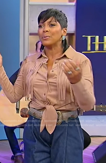Tamron’s brown suede fringe shirt on Tamron Hall Show