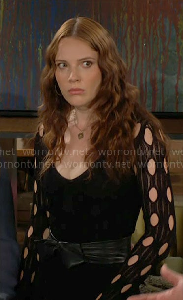 Tessa’s black circle cutout knit dress on The Young and the Restless