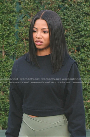 Thea’s black cropped sweatshirt on All American Homecoming