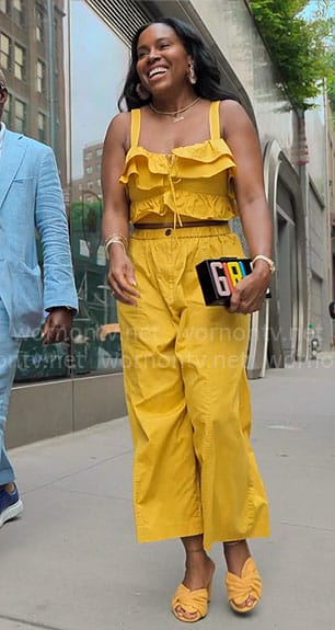 Tricia’s yellow ruffled crop top and pants set on Owning Manhattan