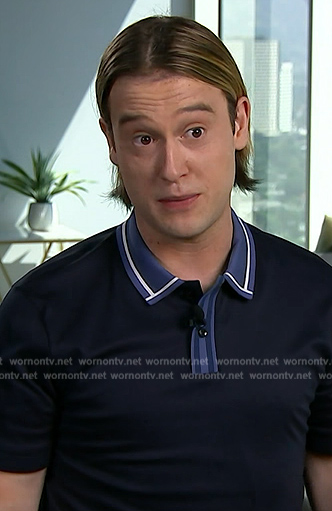 Tyler Henry’s navy contrast collar polo on E! News