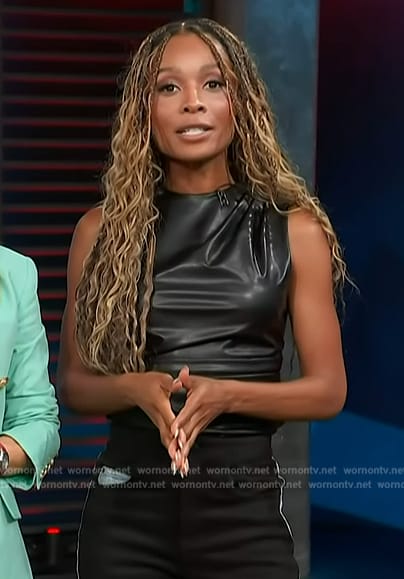 Zuri’s black leather top and jeans on Access Hollywood
