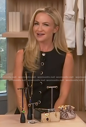 Maria Provenzano’s black button down sleeveless top on Access Hollywood