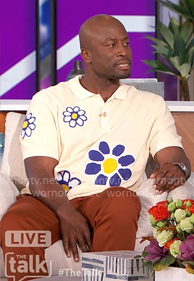 Akbar’s flower print polo shirt on The Talk