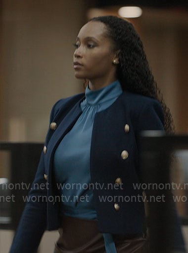 Andrea’s navy jacket with gold buttons on The Lincoln Lawyer