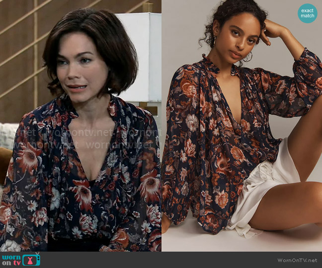 By Anthropologie The Estela Sheer Printed Blouse in Blue Motif worn by Elizabeth Webber (Rebecca Herbst) on General Hospital