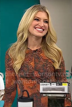 Ashley Bellman’s orange paisley print dress on CBS Mornings