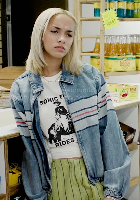 Ava’s striped denim jacket and graphic t-shirt on High Potential