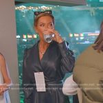 Britani’s navy leather wrap romper on The Real Housewives of Salt Lake City