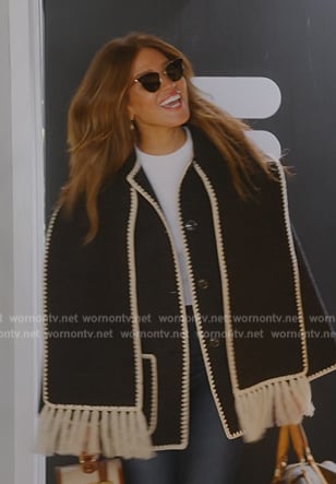 Brynn’s black contrast fringe cardigan on The Real Housewives of New York City