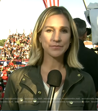 Caitlin Huey-Burns’s green utility jacket on CBS Evening News