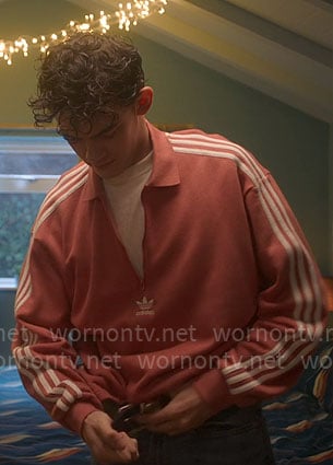 Charlie’s coral Adidas pullover on Heartstopper