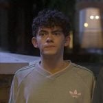Charlie’s green and pink Adidas sweatshirt on Heartstopper