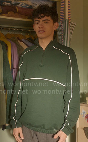 Charlie’s green pullover with white piping on Heartstopper