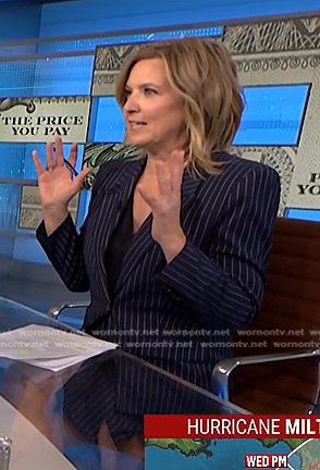 Christine Romans’ navy pinstripe blazer and skirt suit on NBC News Daily