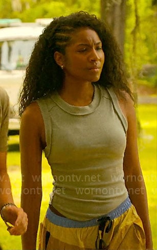 Cleo’s sage tank top and colorblock cargo pants on Outer Banks