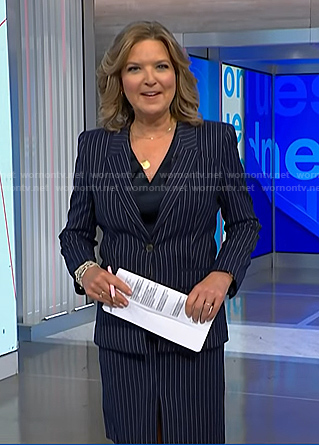 Christine Romans’ navy pinstripe blazer and skirt suit on NBC News Daily