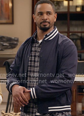 Damon’s navy blue bomber jacket on Poppas House
