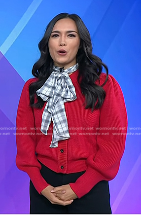 Emilie’s red cardigan with plaid tie on Today