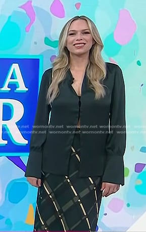 Erin Foster’s green satin shirt and plaid skirt on Today