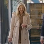 Gina’s beige trench coat on The Real Housewives of Orange County