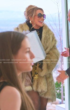 Heather’s black dress and fur coat on The Real Housewives of Salt Lake City