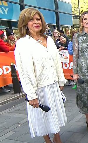 Hoda’s white cable knit cardigan and pleated dress on Today