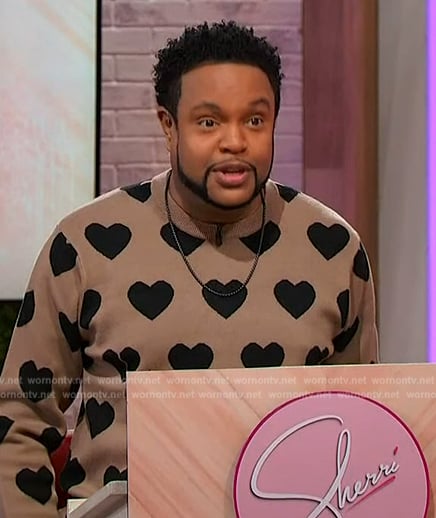 Jawn’s beige heart print sweater on Sherri