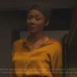 Jax’s gold satin blouse on Reasonable Doubt