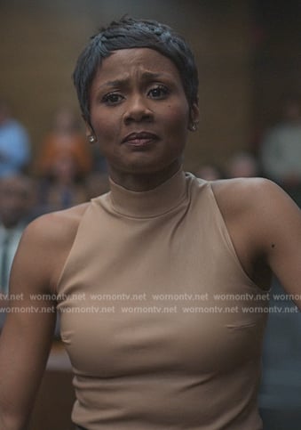 Jax’s beige mock neck top on Reasonable Doubt