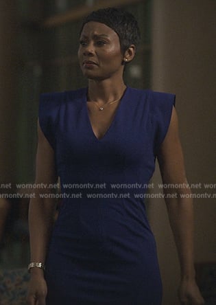 Jax’s blue v-neck dress on Reasonable Doubt