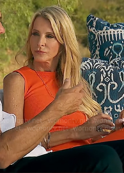 Joan’s orange rib knit midi dress with back cutout on The Golden Bachelorette