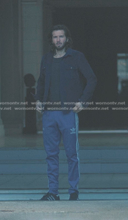John Hunter’s blue side stripe track pants on American Horror Stories